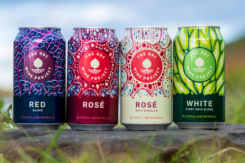 image of 12oz cans of the four odell wine project flavors, red blend rose, rose with bubble, and the white pinot gris blend